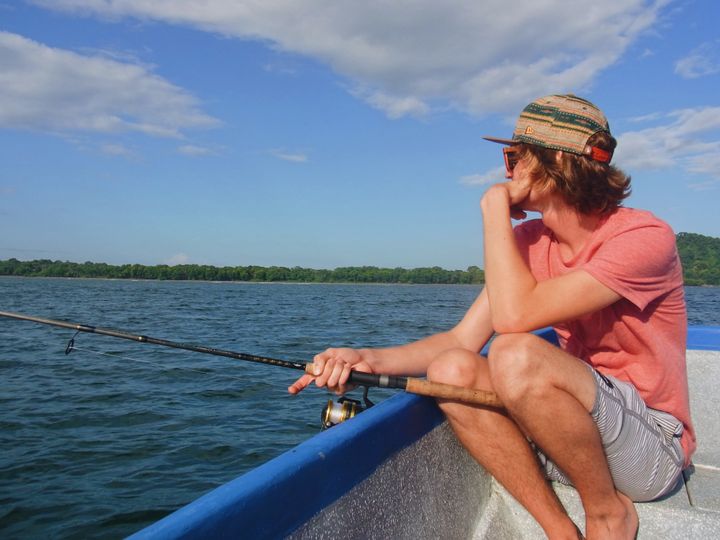 My boyfriend Thomas enjoying some early morning fishing in Tortuguero on a local man’s boat.