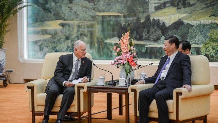 California Governor Jerry Brown conferred for nearly an hour with Chinese President Xi Jinping in Beijing’s Great Hall of the People.