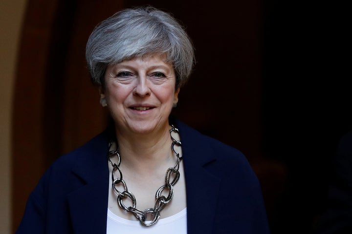 Britain's Prime Minister Theresa May leaves after a church service in Sonning, Britain. 