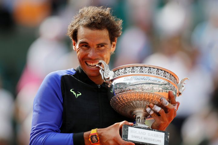 French Open, Roland Garros, Paris, France - June 11, 2017: Spain's Rafael Nadal celebrates with the trophy after winning the French Open final against Switzerland's Stan Wawrinka. (Reuters / Benoit Tessier)