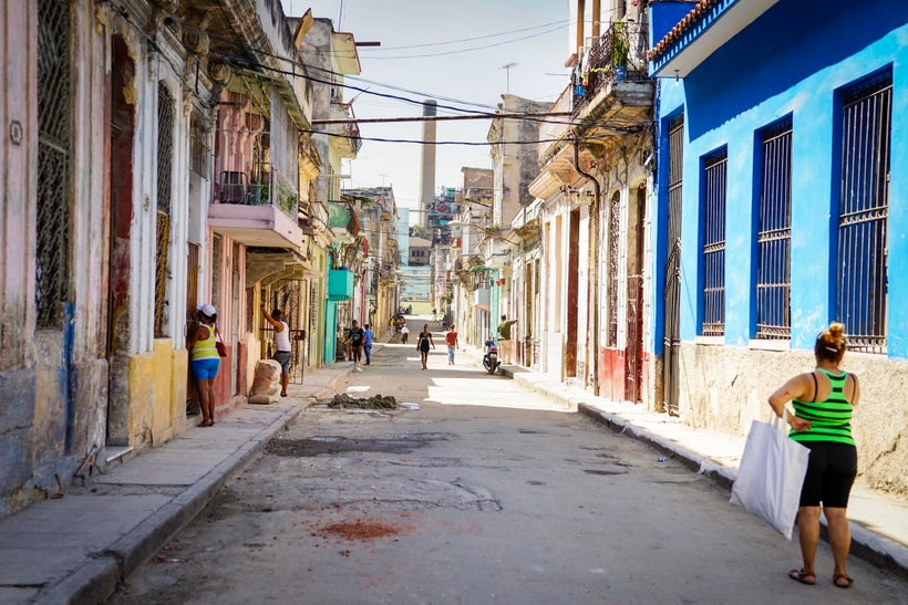 Exploring neighborhoods outside of the main tourist areas—even if they seem desolate and scary at first—can get you shots tha