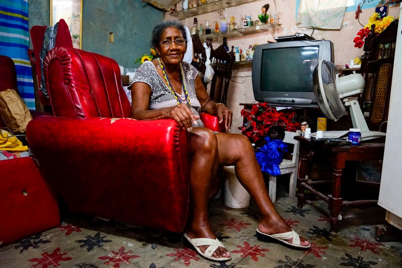 I wandered into what seemed like a brothel building and was ushered by two women to the home of this older woman who told me