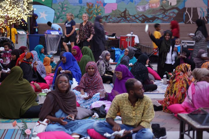 People attend an interfaith iftar outside Cedar Cultural Center in Minneapolis. 
