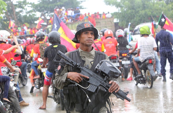 A police officer in the streets of Dili, Timor Leste. Lirio da Fonseca.