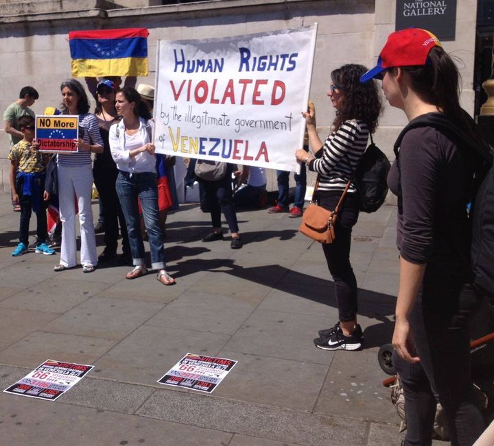 Demonstrators protest against human rights violations in Venezuela outside the National Gallery in London on 10 June.