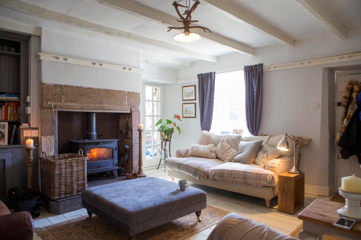 A beautiful photo of a cosy living room SolStock via Getty Images