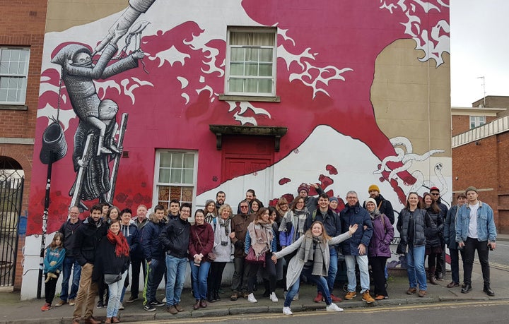 John Nation now guides visitors around Bristol's street art scene via WhereTheWall. Pictured here is one his recent tour groups.