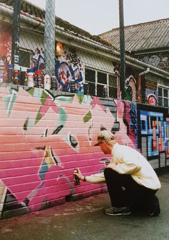 John Nation founded the project as a way to channel young people's creativity in a positive and legal way. Here he is pictured painting at the center in the late 80s.