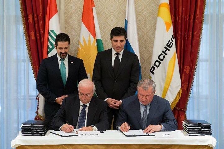 The Minister of Natural Resources for the Kurdistan Regional Government Ashti Hawrami and Rosneft CEO Igor Sechin sign an oil agreement in Saint Petersburg, Russia, on June 2, 2017, as the Kurdish Deputy Prime Minister Qubad Talabani and Prime Minister Nechirvan Barzani look on.