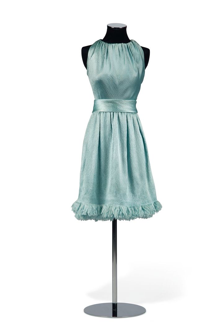 A sky blue cloquee short dress by Givenchy - with estimate: £10,000-£15,000.