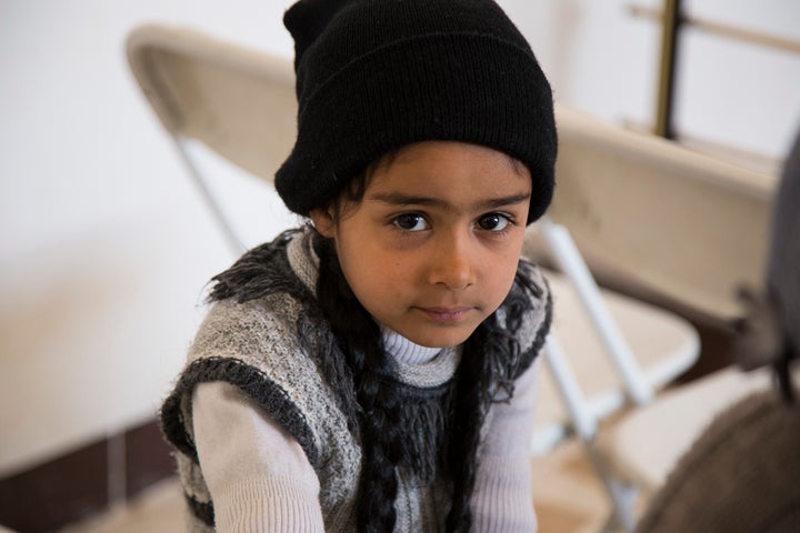 A little girl in the primary health clinic in Arkan, a neighborhood in eastern Mosul, sees approximately 100 patients a day, according to its staff. The most common health issue the clinic sees, according to doctors working there, are skin diseases, likely the result of the persistent lack of water in Mosul. "We suffer from a shortage of everything, from staff to water and medicines," one of the doctors said. International Medical Corps, with funding from the EU's humanitarian aid budget, is making infrastructure repairs at the clinic and providing medicines, generator fuel, and other support.