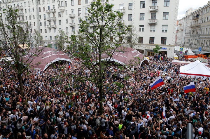 Demonstrators take part in an anti-corruption protest organised by opposition leader Alexei Navalny, on Tverskaya Street in c