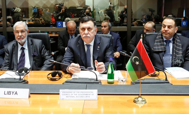 Libyan Prime Minister Faiez Mustafa Serraj (centre) at a meeting in Rome in March 2017.