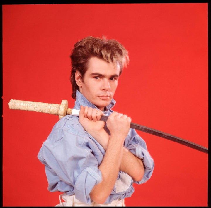 Nik in the 1980s, complete with samurai sword