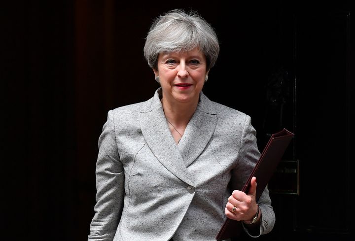 Theresa May leaves No.10 Downing Street.