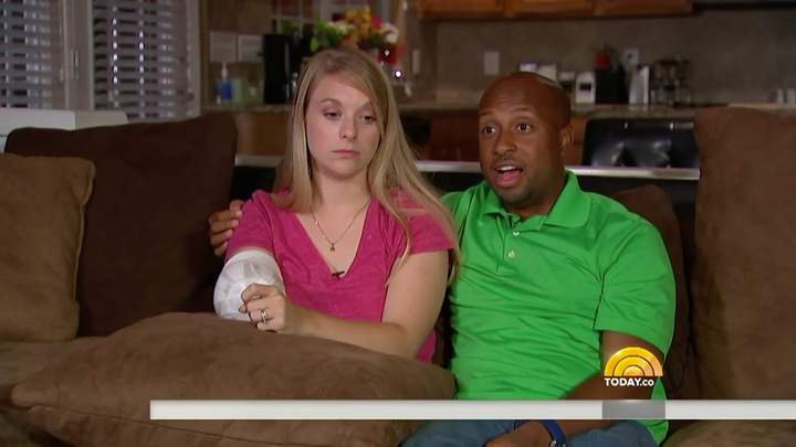 Tiffany Johnson, seen here with her husband James, was described as remarkably calm after having her arm torn off by a s