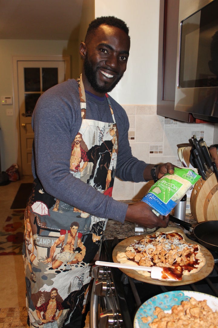 David helps Eric at a Pampered Chef Party in Rochester, New York. 