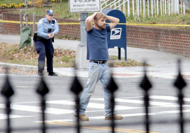 Edgar Welch is apprehended on Dec. 4 after firing a gun in the Comet Ping Pong pizzeria in Washington, D.C.