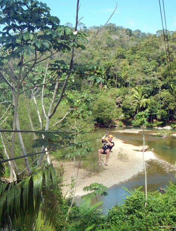 Zip lining through the jungle canopy on our afternoon excursion in the Cayo.