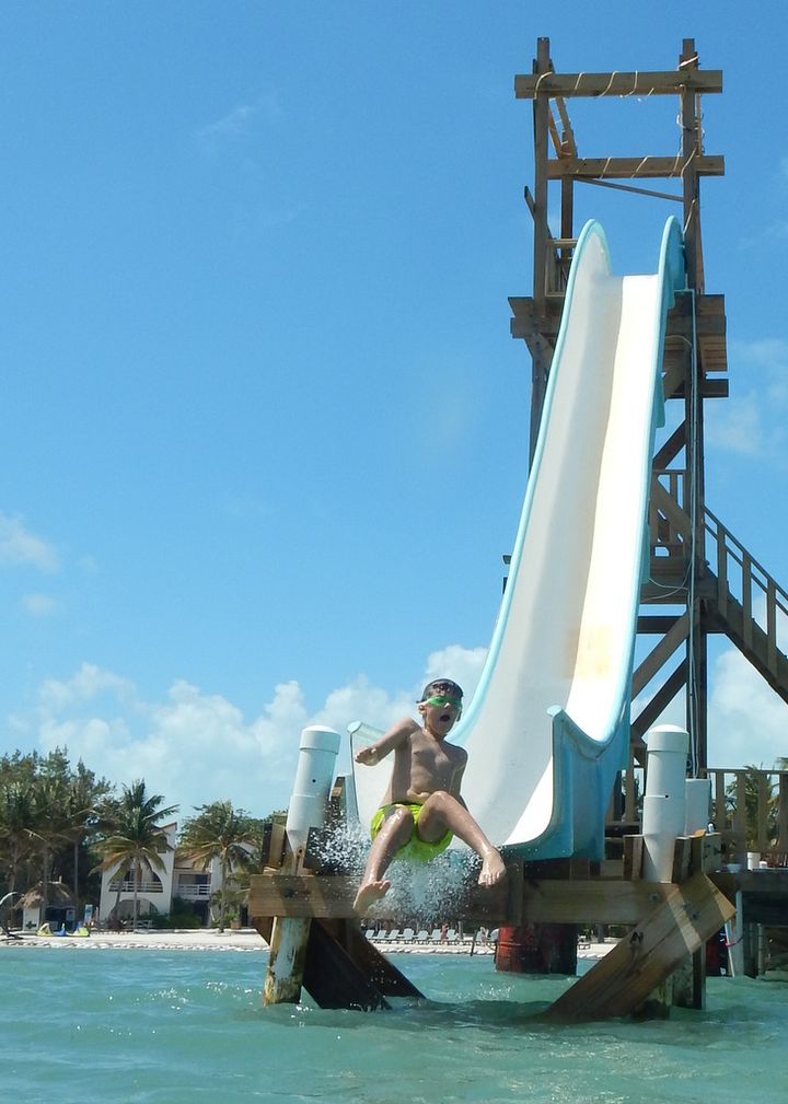 Caribbean Villas boasts the best entry into the ocean with a 20-foot slide for kids next to the pier’s bar and outdoor lounge.