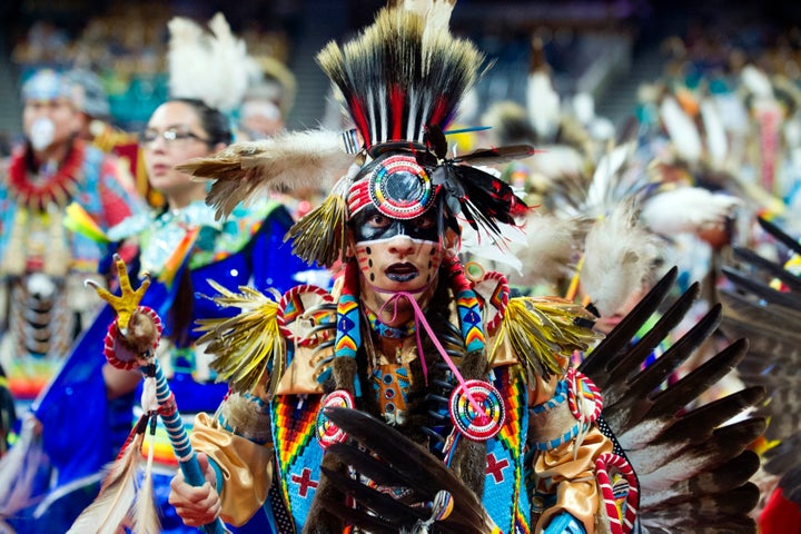 Ziggy Williams of the Navajo Nation dances during the Grand Entry of the Denver March Powwow on March 24 in Denver, Colorado.