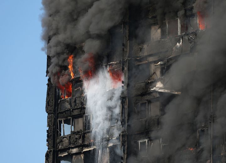 Smoke billows from the fire that engulfed the 24-storey Grenfell Tower in west London 