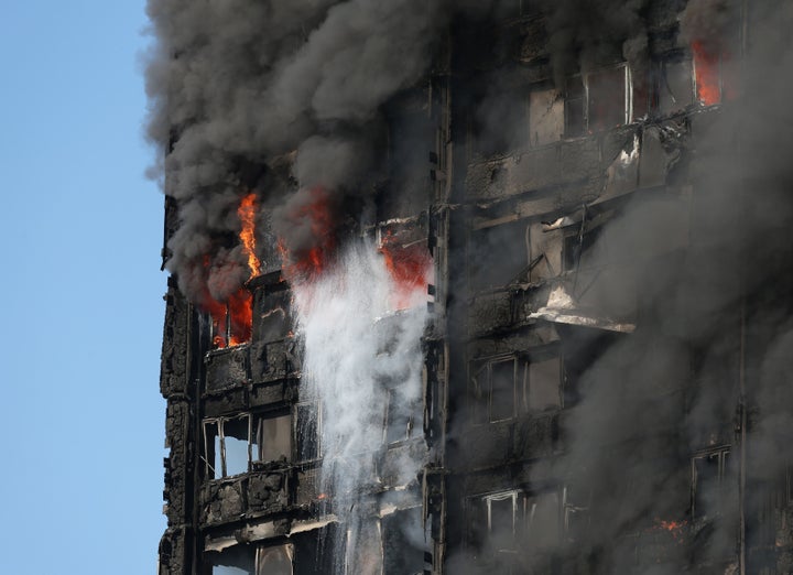 Smoke billows from the fire that engulfed the 24-storey Grenfell Tower in west London