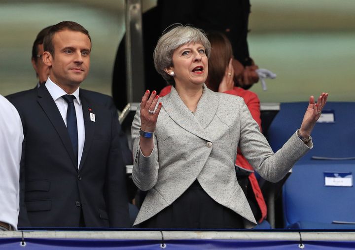 French President Emmanuel Macron (left) and Theresa May.