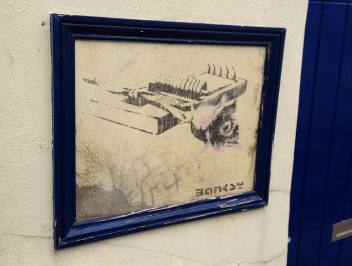 An early Banksy stencil in his home city of Bristol.