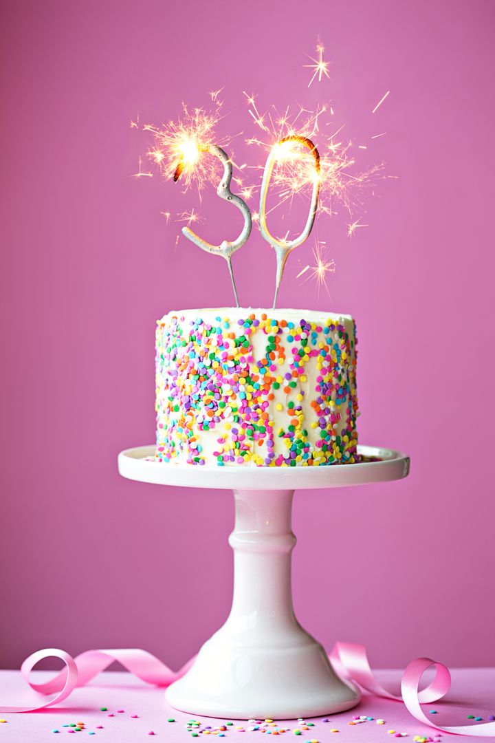 30th birthday cake with sparklers RuthBlack via Getty Images