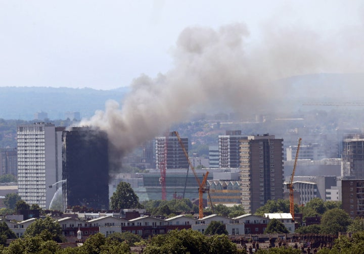 Grenfell Tower continues to smoke on Wednesday afternoon