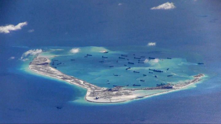  Chinese dredging vessels in the waters around the Mischief Reef, South China Sea, September 2016. 
