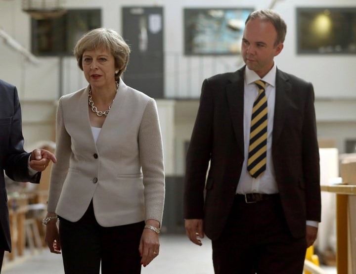 Theresa May and former housing minister Gavin Barwell.