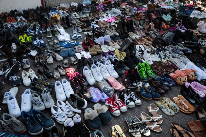 Donated shoes sit in the Westway Sports Centre near to the site of the Grenfell Tower fire on June 15, 2017 in London, England. 