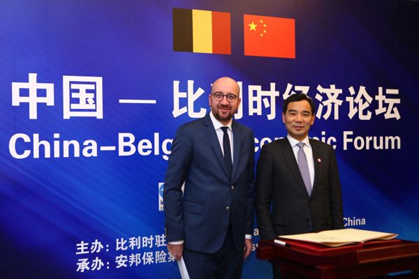 Anbang Insurance Group Chairman Wu Xiaohui and Belgian Prime Minister Charles Michel at the China-Belgium Economic Forum in Brussels, Belgium last October. Wu is likely to be harshly punished for power-related corruption./ Source: Xinhua News Agency 