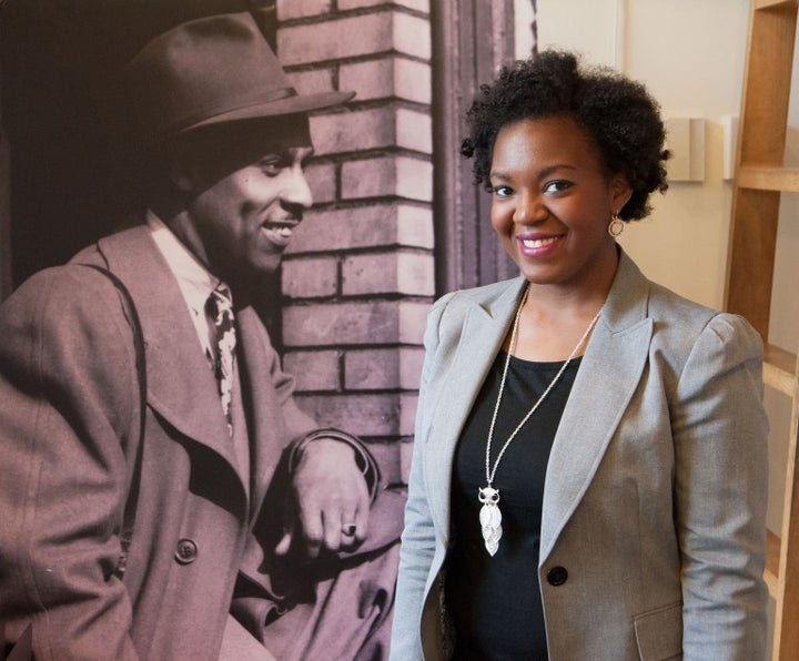 Dominique Luster, Teenie Harris Archivist with photo of Teenie Harris