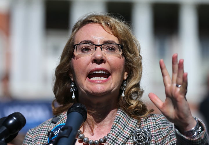 Gabrielle Giffords addresses a crowd during a rally for gun reform in Boston on Oct. 14, 2016.