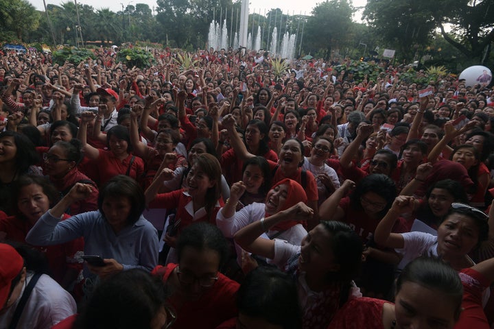 Supporters of former Jakarta governor Basuki Tjahaja Purnama, popularly known as Ahok, gather at city hall a day after after a court sentenced him to two years in jail following blasphemy charges, in Jakarta, Indonesia May 10, 2017.