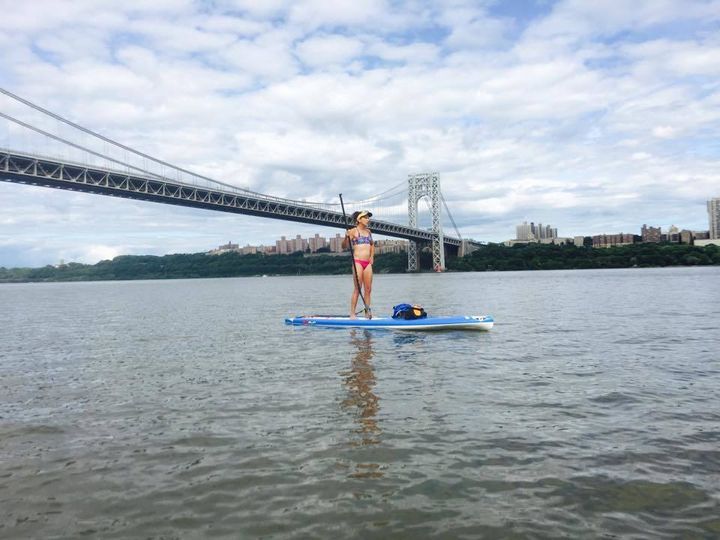 Stefani (author) & George Washington Bridge on Manhattan Kayak & SUP - SUP Tour