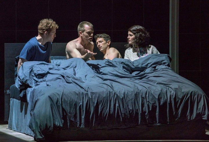 Andrew Garland, Michael Weyandt, Aaron Blake, and Sarah Beckham-Turner in a bed of difficult dreams in Angels in America. 