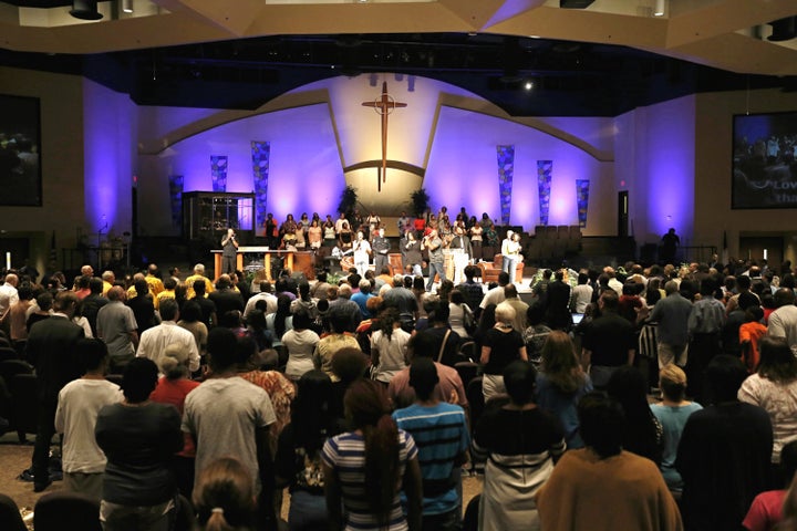 Hundreds gather for a "Unity, Peace and Prayer Rally" at Cornerstone Baptist Church in Arlington, Texas, where Rev. Dwight McKissic is senior pastor.