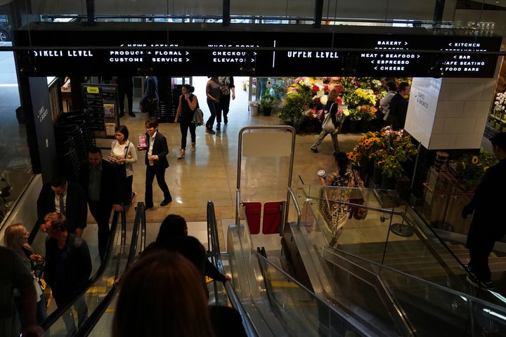 The entrance to a Whole Foods Market in Manhattan, New York City. By buying Whole Foods, Amazon acquires 431 brick-