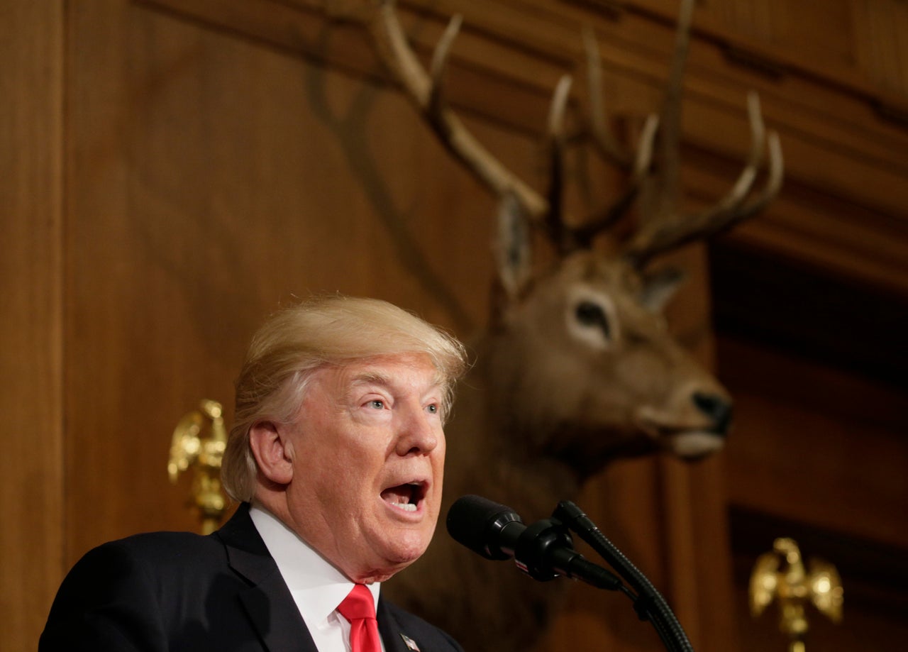 President Donald Trump speaks at the Interior Department before signing an executive order reviewing previous national monument designations made under the Antiquities Act.