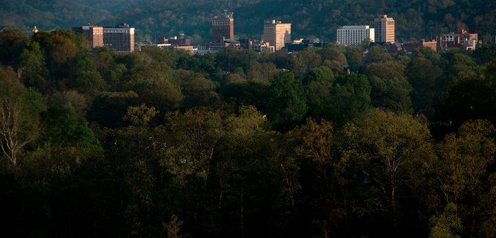 The once economically strong industrial city of Huntington, sometimes described as the epicenter of the opioid crisis, is seen nestled in trees along the Ohio River on April 20, 2017 in West Virginia.
