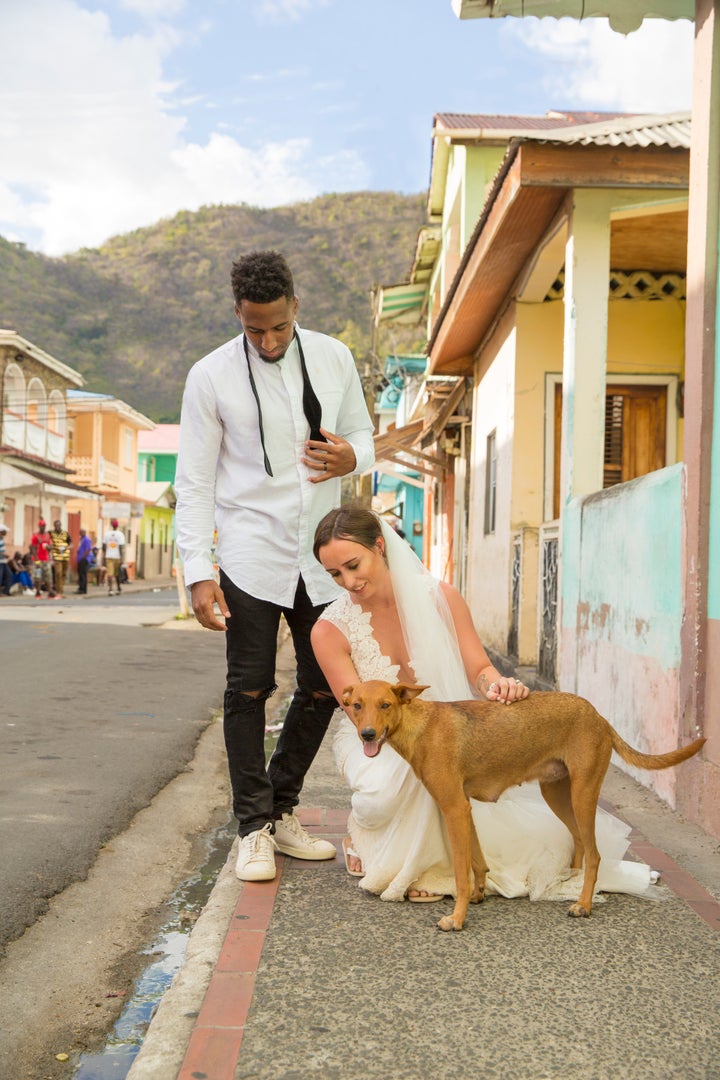 This stray pup, who has since been rescued by HelpAWS, took a liking to the couple and started following them around during their photo shoot. 