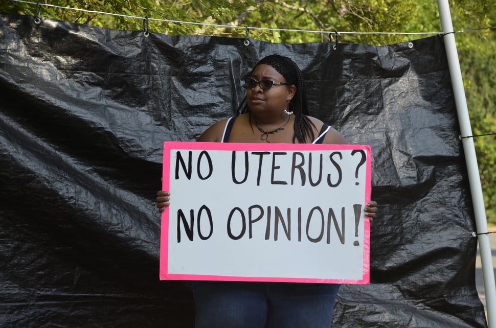 Jasmine Sherman counter-protests outside APWHC last Saturday.