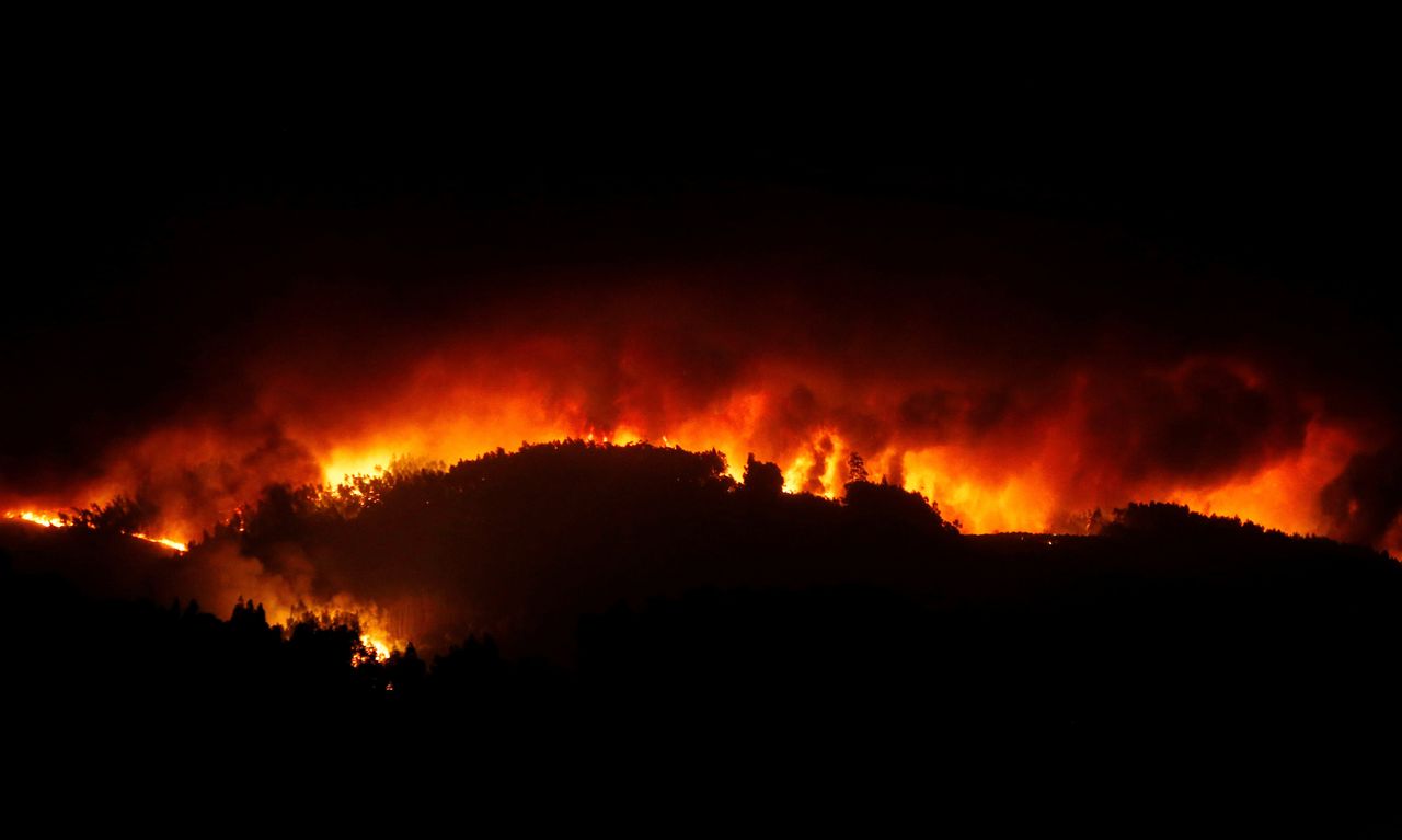 A forest fire is seen near Tojeira, Pedrogao Grande.