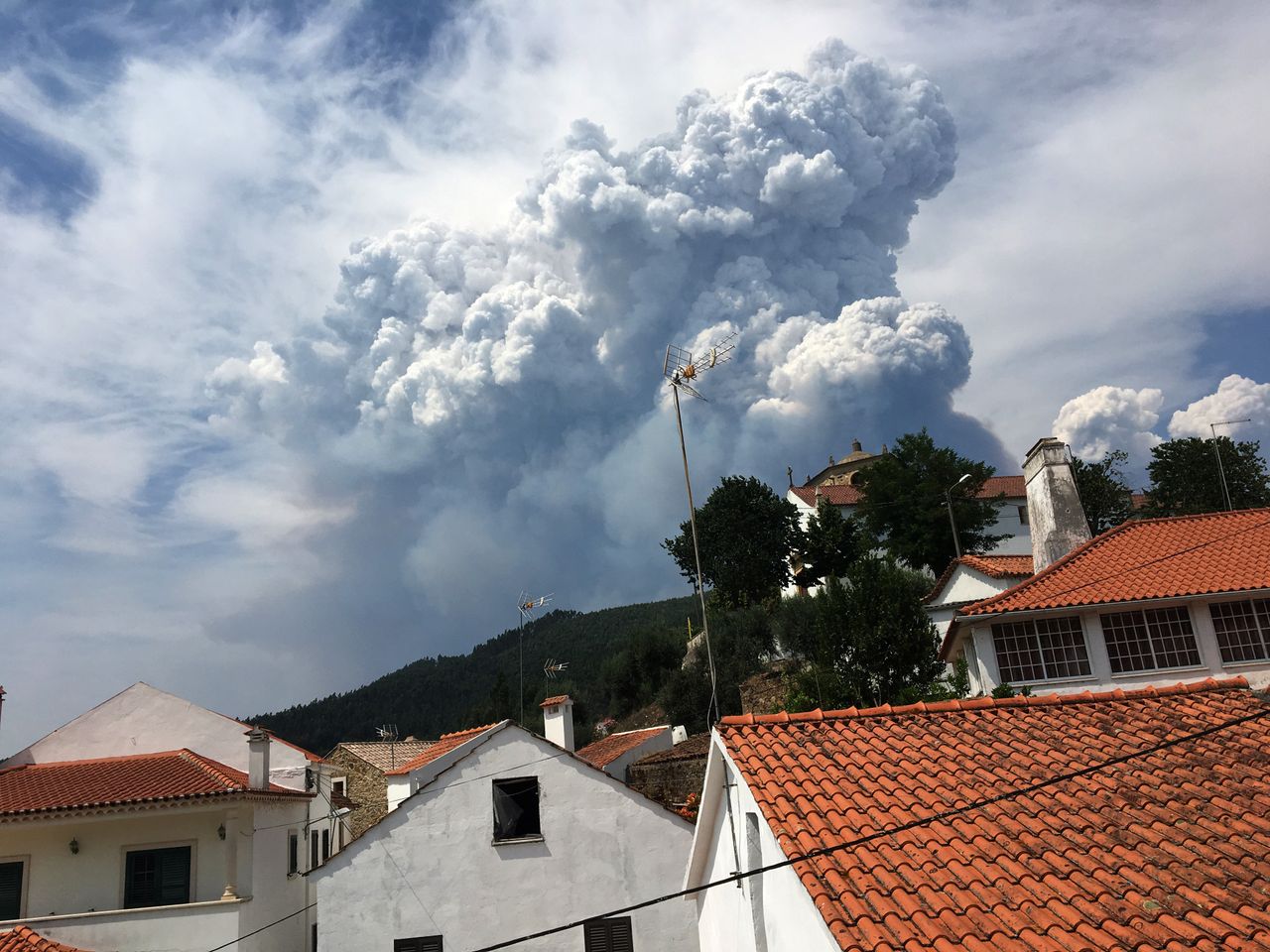 Smoke from a forest fire is seen from the village of Dornes, in central Portugal.