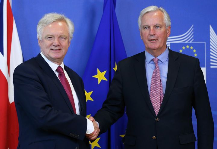 Brexit Secretary David Davis shakes hands with the EU's Chief Negotiator Michel Barnier.