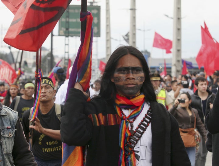  Indigenous Ecuadorians march in Quito to protest the El Mirador copper mining project on March 22 2012. 